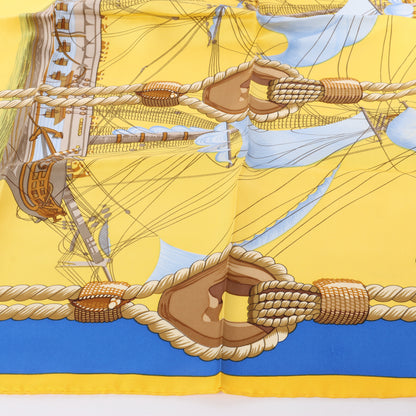 Hermès Carré 90 "Tribord" 100% Silk Scarf in Yellow and Blue