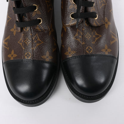 Bottines Louis Vuitton Wonderland Line 21 ans en toile et cuir, noir et marron, NL0271, pointure 40.