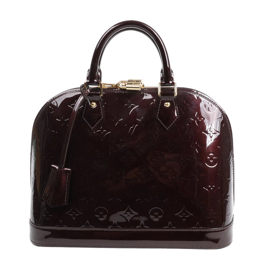 Louis Vuitton Vernis Alma PM handbag in deep Amarante patent leather with embossed monogram pattern, gold-tone hardware, dual top handles, and a structured silhouette, shown on a white background.