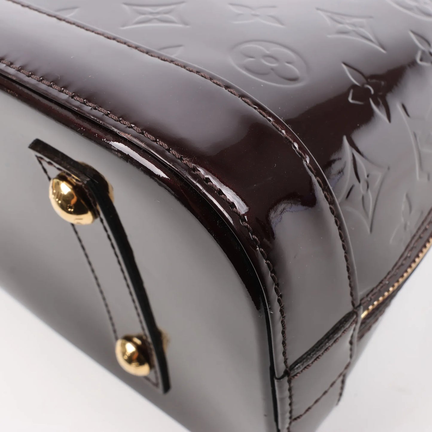 Louis Vuitton Vernis Alma PM Handbag in Amarante M91611