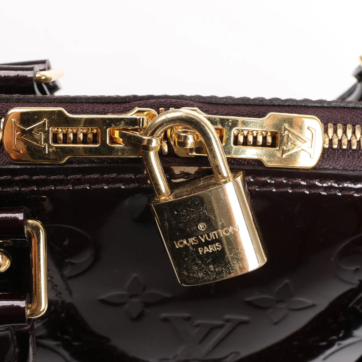 Louis Vuitton Vernis Alma PM Handbag in Amarante M91611