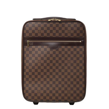 Front view of Louis Vuitton Damier Pégase 45 suitcase N23293 in brown checkered coated canvas, featuring dark brown leather trim, front zip pocket, gold-tone hardware, and two rolling wheels against a white background