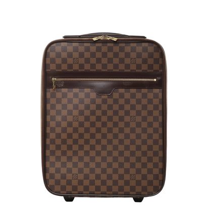 Front view of Louis Vuitton Damier Pégase 45 suitcase N23293 in brown checkered coated canvas, featuring dark brown leather trim, front zip pocket, gold-tone hardware, and two rolling wheels against a white background