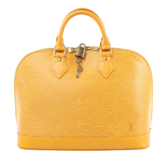 Yellow handbag with a lock on a white background