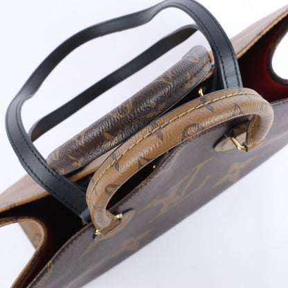 Louis Vuitton Riesiges Monogramm Reverse On the Go MM in Braun M45321
