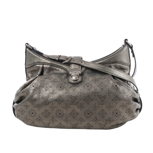 Silver handbag with a pattern on a white background