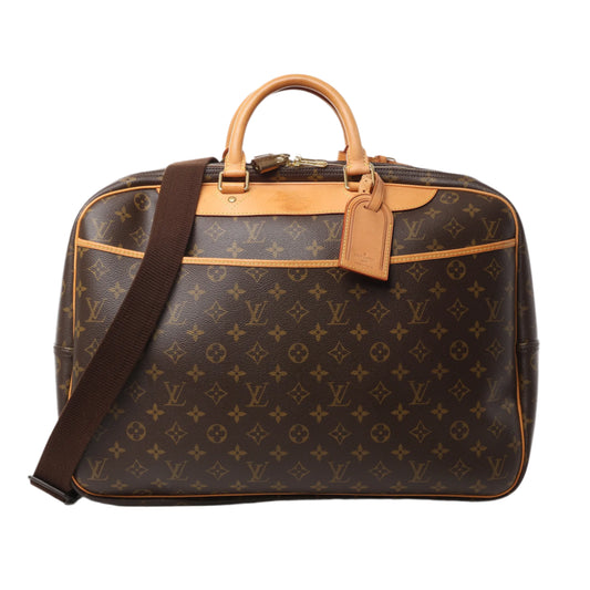 Front view of Louis Vuitton Alize 2 Poches Travel Bag M41399 featuring Monogram canvas, natural cowhide leather handles and trim, brown adjustable shoulder strap, and gold-tone hardware, displayed against a white background.