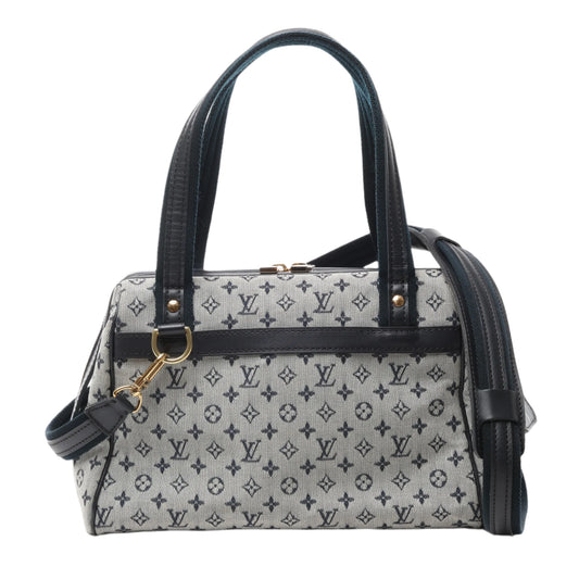Front view of Louis Vuitton Monogram Mini Josephine PM Handbag M92312 in gray and navy jacquard canvas with LV monogram pattern, navy leather trim, dual top handles, detachable shoulder strap, and gold-tone hardware, displayed against a white background.