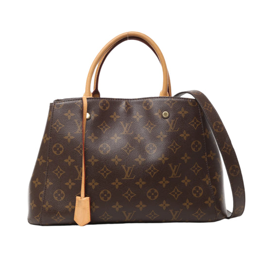 Front view of Louis Vuitton Monogram Montaigne MM 2Way Handbag M41056 in brown Monogram canvas with natural leather top handles, detachable shoulder strap, and gold-tone hardware, displayed against a white background.