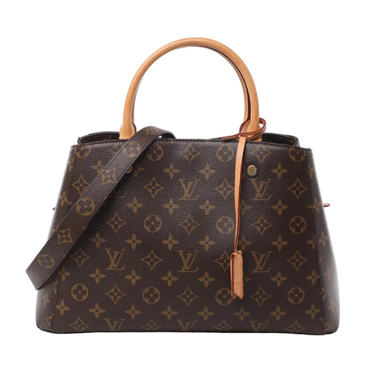 Front view of Louis Vuitton Monogram Montaigne MM 2Way Handbag M41056 in brown monogram coated canvas, featuring natural leather top handles, detachable shoulder strap, and gold-tone hardware against a white background.