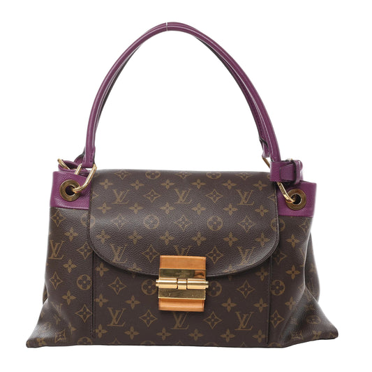 The Louis Vuitton Monogram Olympe M41057 blends classic brown monogram canvas with bold purple leather accents. Featuring gold-tone hardware and a chic shoulder design, it’s a perfect statement piece for elevated everyday style.