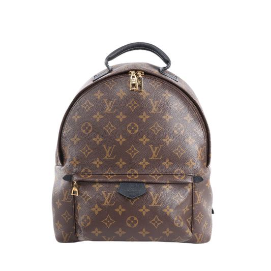 Brown backpack with monogram pattern on a white background