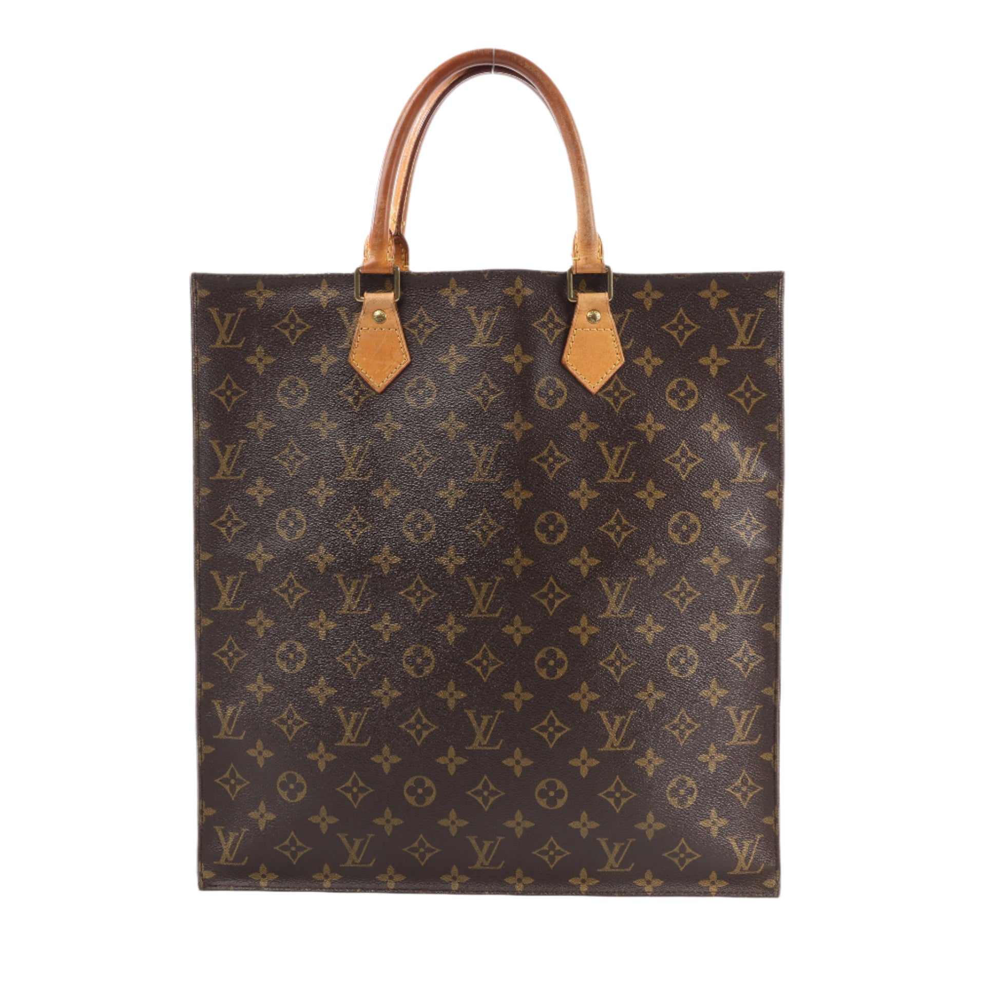 Designer handbag with monogram pattern on a white background