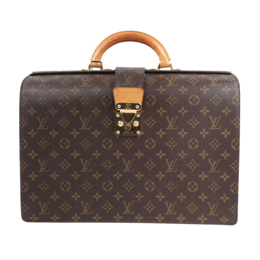 Brown Louis Vuitton suitcase with monogram pattern on a white background