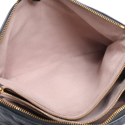 Louis Vuitton Coussin PM 2Way-Umhängetasche mit Monogrammprägung in Schwarz M57790