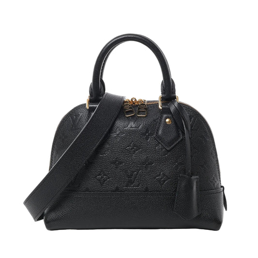 Front view of Louis Vuitton Monogram Empreinte Alma BB 2Way Handbag M44829 in black leather, with embossed LV monogram pattern, gold-tone hardware, dual top handles, and detachable shoulder strap against a white background.