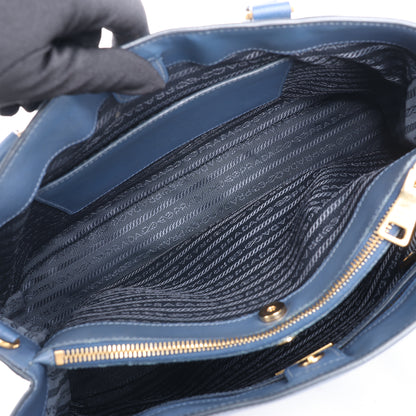 Sac à main Prada Galleria Saffiano Lux en cuir bleu