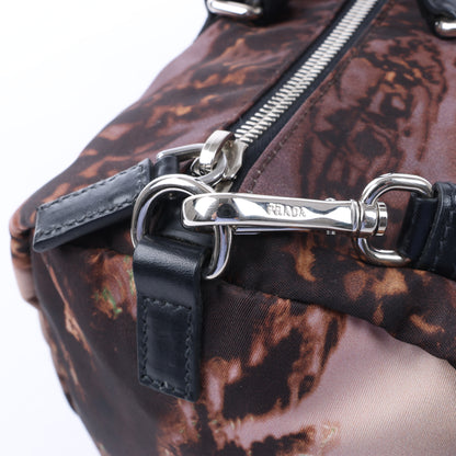 Sac à main Prada en nylon et cuir imprimé, double sens, noir et violet, BL0922