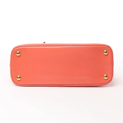 Sac à main Prada Saffiano Vernice Dome en cuir bidirectionnel, couleur bégonia BL0909