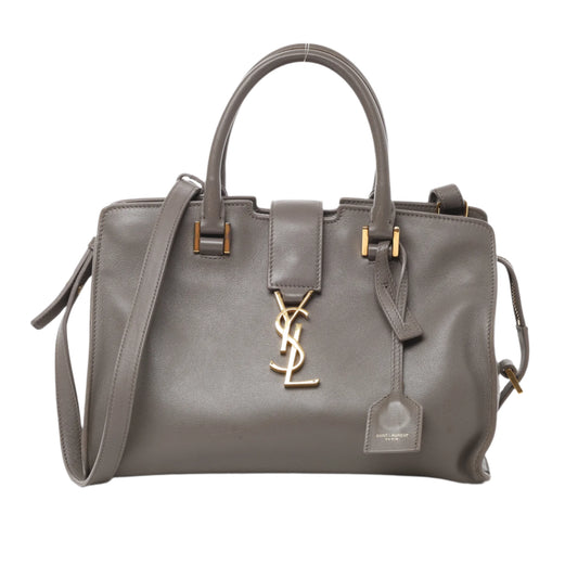 Front view of Saint Laurent Paris Baby Cabas Leather 2Way Handbag 424868 in gray smooth leather with gold-tone YSL logo, dual top handles, and detachable shoulder strap, displayed against a white background.