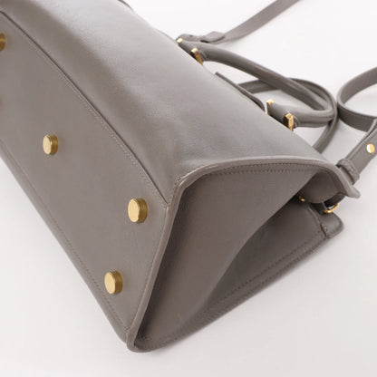Sac à main double usage en cuir Baby Cabas Saint Laurent Paris, gris 424868