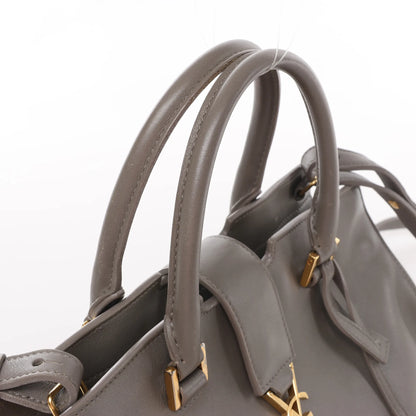 Sac à main double usage en cuir Baby Cabas Saint Laurent Paris, gris 424868