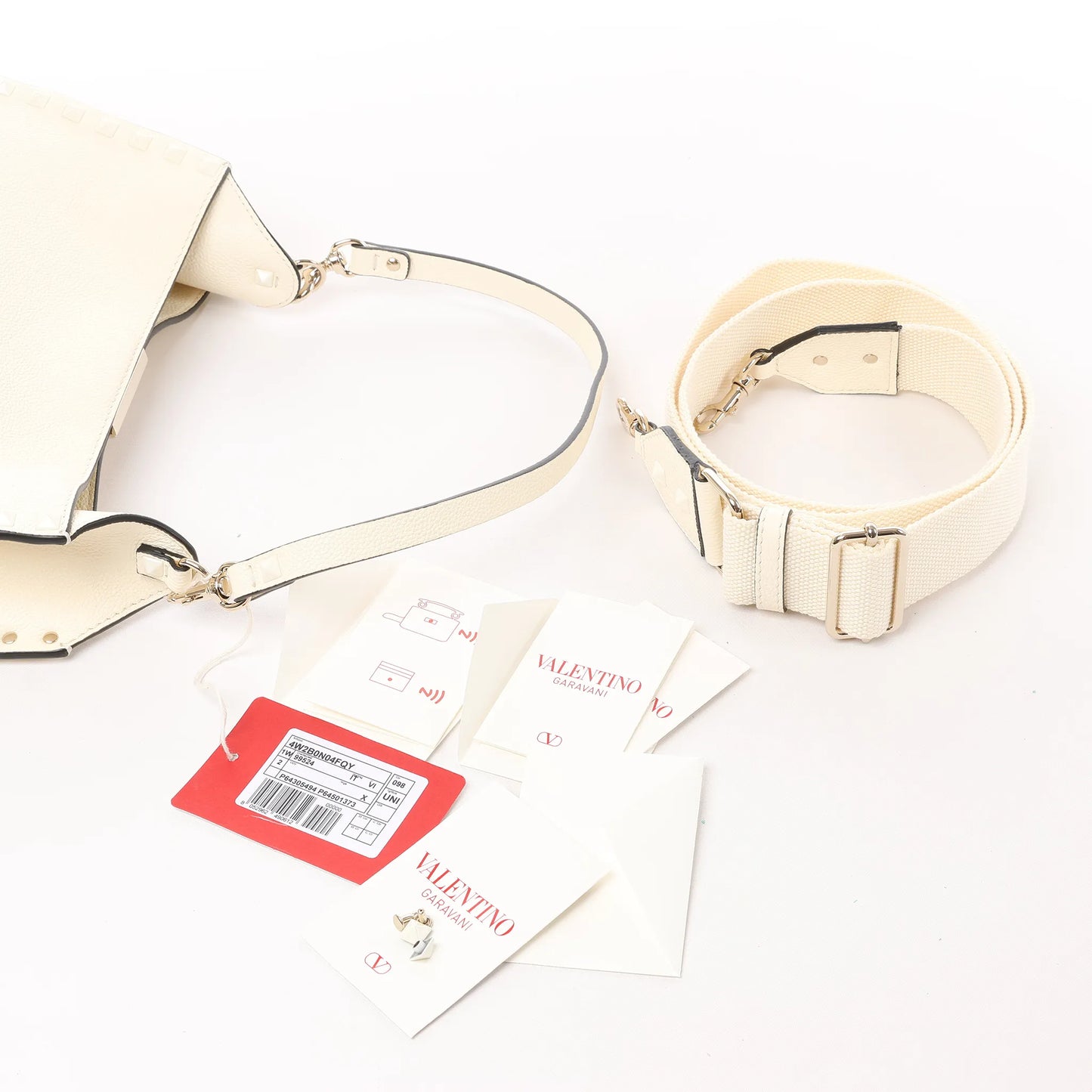 Valentino Garavani Sac à bandoulière en cuir Rockstud en écru