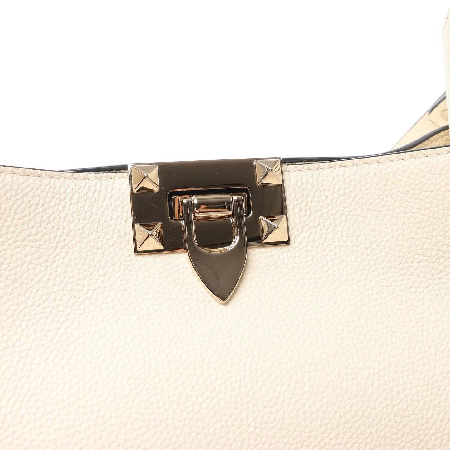 Valentino Garavani Sac à bandoulière en cuir Rockstud en écru